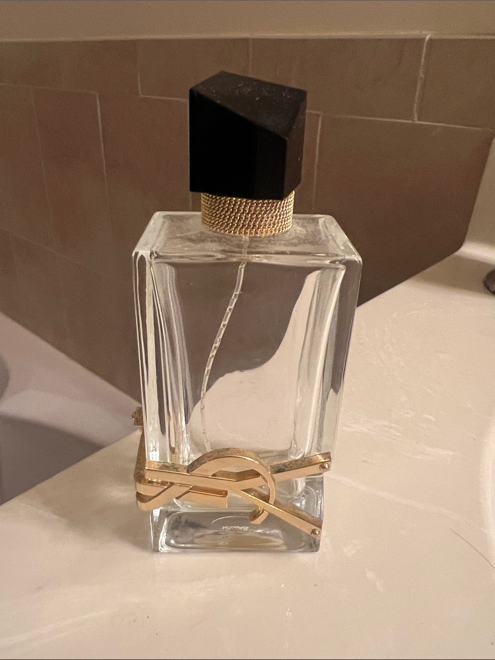 Empty YSL perfume bottle